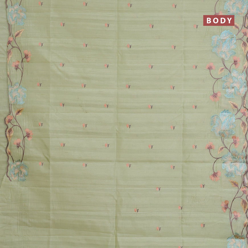 Semi raw silk saree mild pista green with embroidery work buttas and floral design embroidery work border