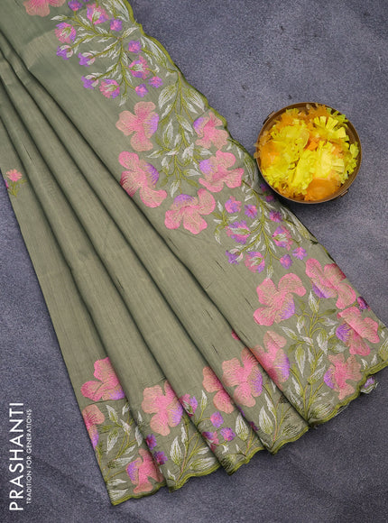 Semi raw silk saree elaichi green with embroidery work buttas and floral design embroidery work border