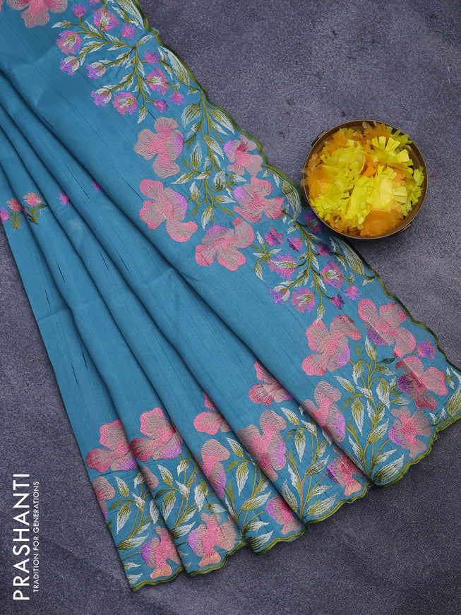 Semi raw silk saree teal blue with embroidery work buttas and floral design embroidery work border