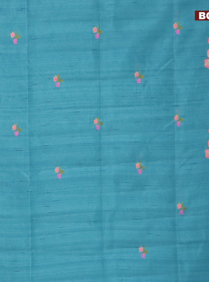 Semi raw silk saree teal blue with embroidery work buttas and floral design embroidery work border