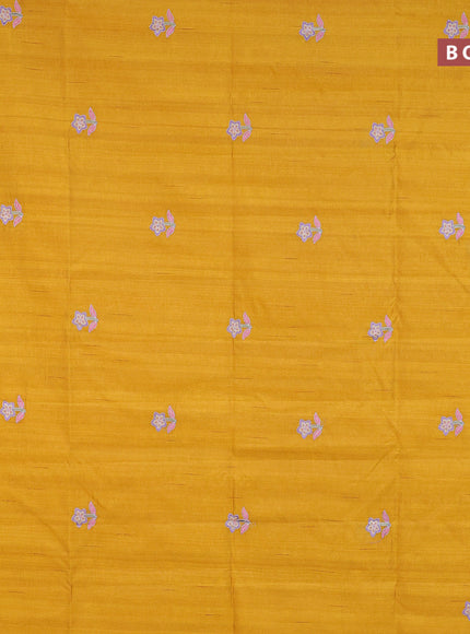 Semi raw silk saree mustard yellow with embroidery work buttas and floral design embroidery work border