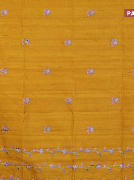 Semi raw silk saree mustard yellow with embroidery work buttas and floral design embroidery work border