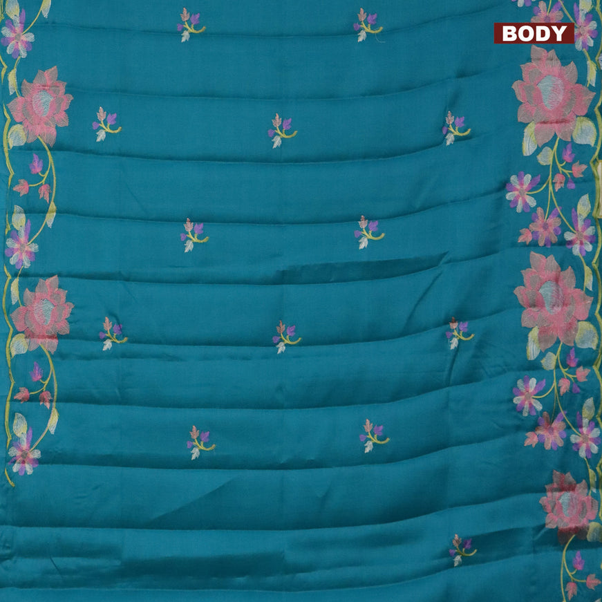 Semi raw silk saree teal green with embroidery work buttas and floral design embroidery work border