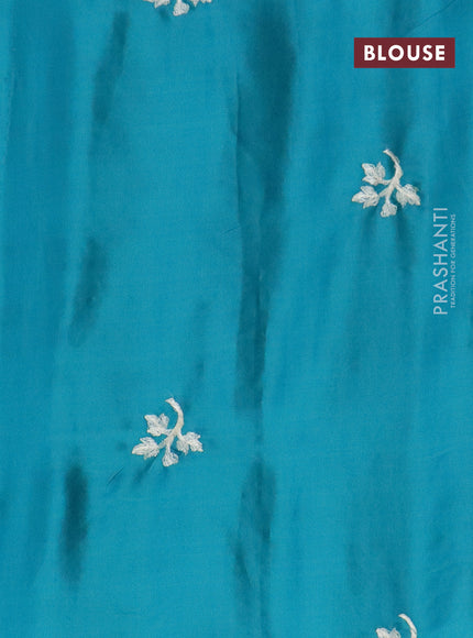 Semi raw silk saree teal green with embroidery work buttas and floral design embroidery work border