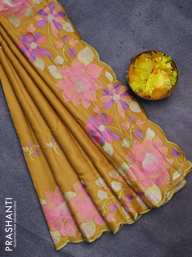 Semi raw silk saree mustard yellow with embroidery work buttas and floral design embroidery work border