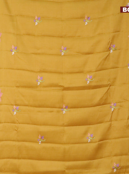 Semi raw silk saree mustard yellow with embroidery work buttas and floral design embroidery work border