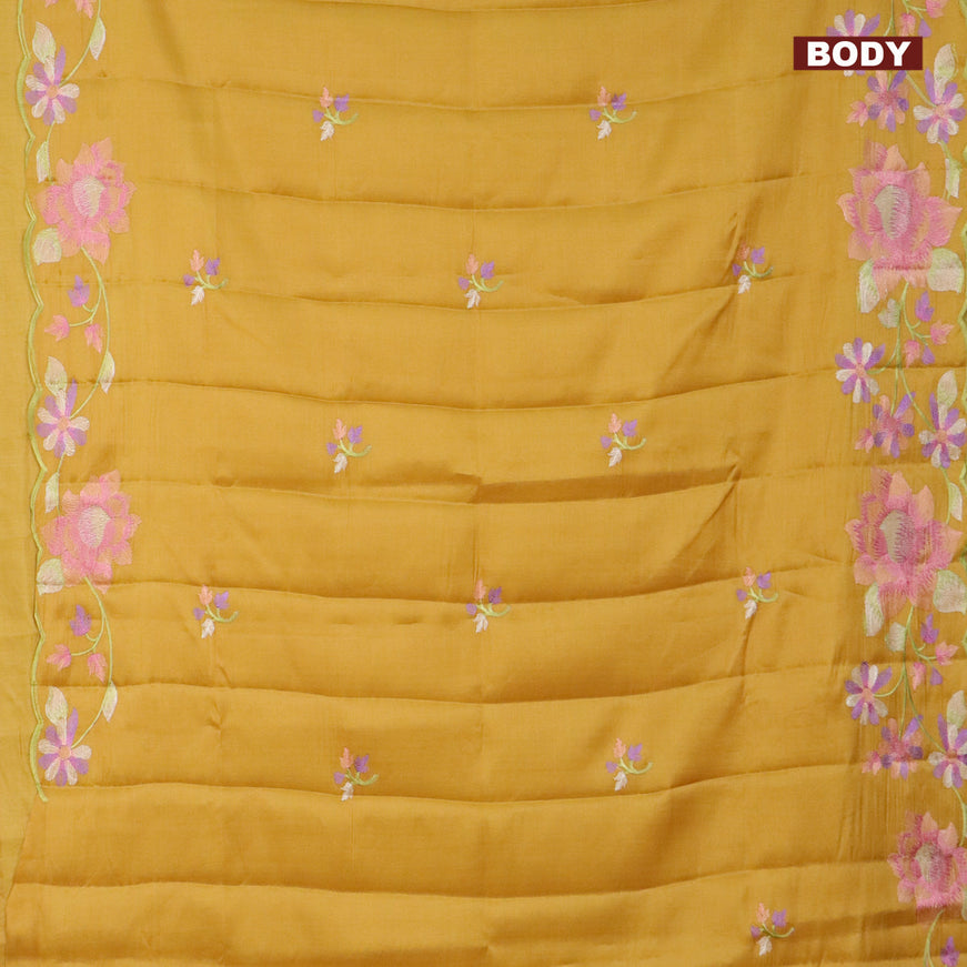 Semi raw silk saree mustard yellow with embroidery work buttas and floral design embroidery work border