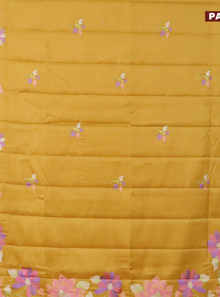 Semi raw silk saree mustard yellow with embroidery work buttas and floral design embroidery work border