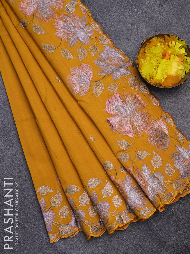 Semi raw silk saree mustard yellow with embroidery work buttas and floral design embroidery work border