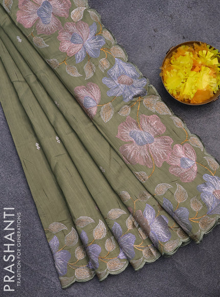 Semi raw silk saree pastel green shade with embroidery work buttas and floral design embroidery work border