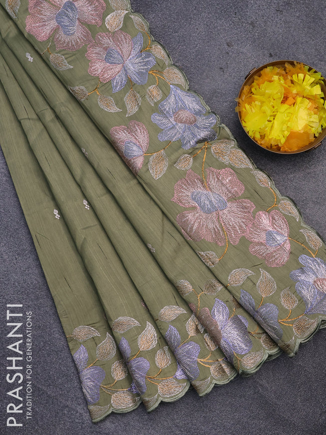 Semi raw silk saree pastel green shade with embroidery work buttas and floral design embroidery work border