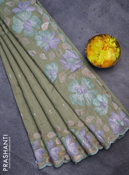 Semi raw silk saree pastel green shade with embroidery work buttas and floral design embroidery work border