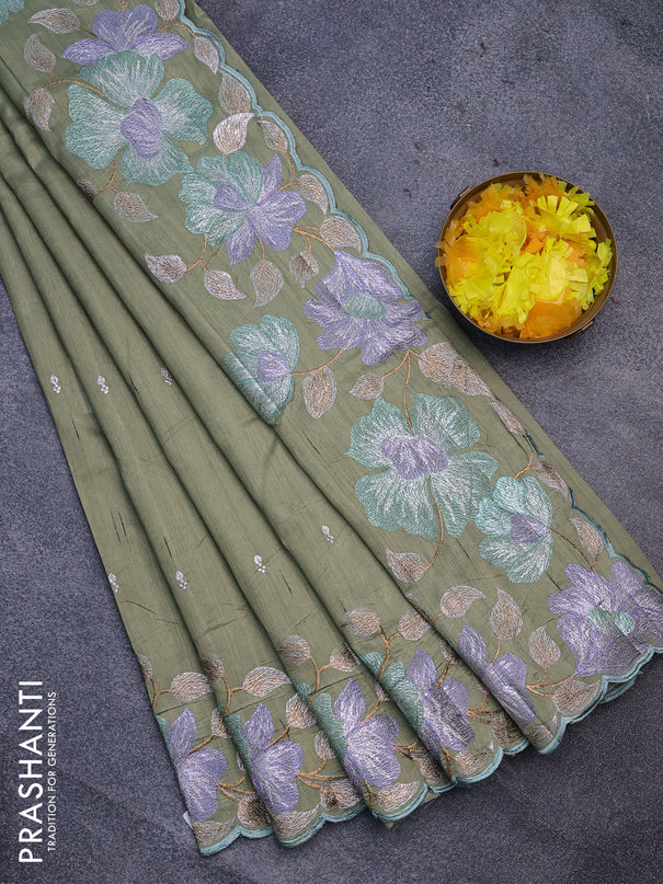 Semi raw silk saree pastel green shade with embroidery work buttas and floral design embroidery work border