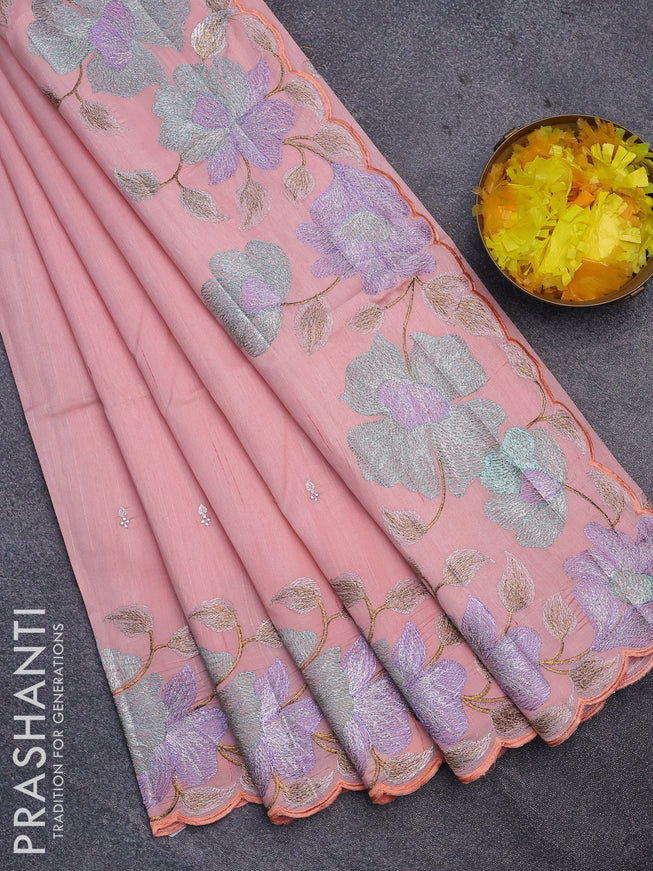 Semi raw silk saree peach shade with embroidery work buttas and floral design embroidery work border