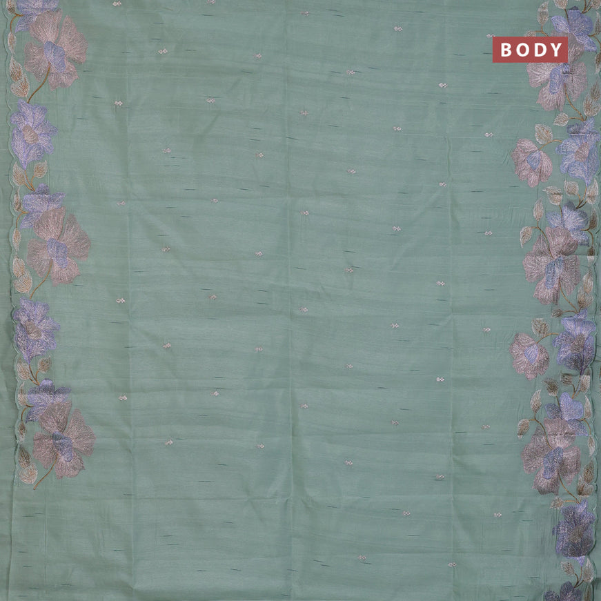 Semi raw silk saree pastel green shade with embroidery work buttas and floral design embroidery work border