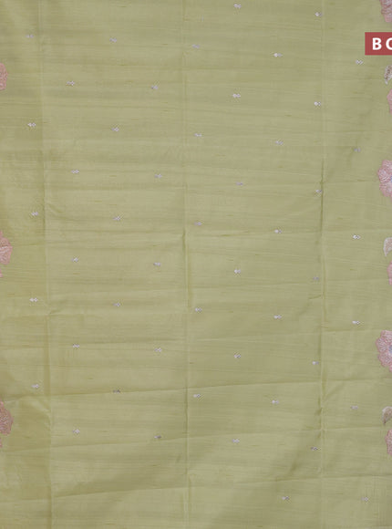 Semi raw silk saree mild pista green with embroidery work buttas and floral design embroidery work border