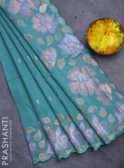 Semi raw silk saree teal blue with embroidery work buttas and floral design embroidery work border