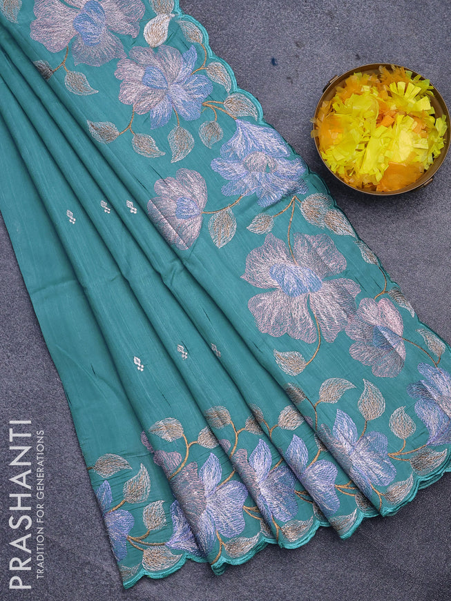 Semi raw silk saree teal blue with embroidery work buttas and floral design embroidery work border