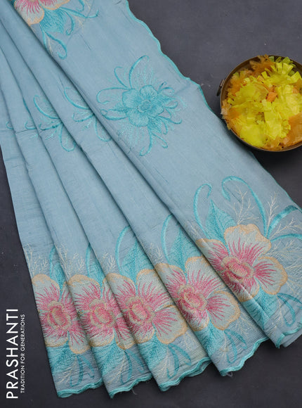 Semi raw silk saree teal blue shade with embroidery work buttas and floral design embroidery work butta border