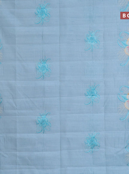 Semi raw silk saree teal blue shade with embroidery work buttas and floral design embroidery work butta border