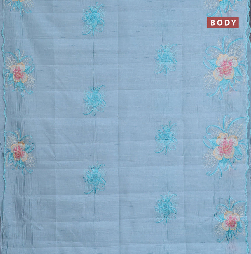 Semi raw silk saree teal blue shade with embroidery work buttas and floral design embroidery work butta border