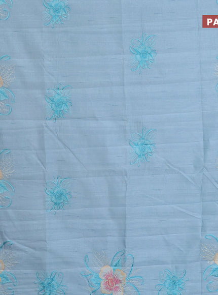 Semi raw silk saree teal blue shade with embroidery work buttas and floral design embroidery work butta border