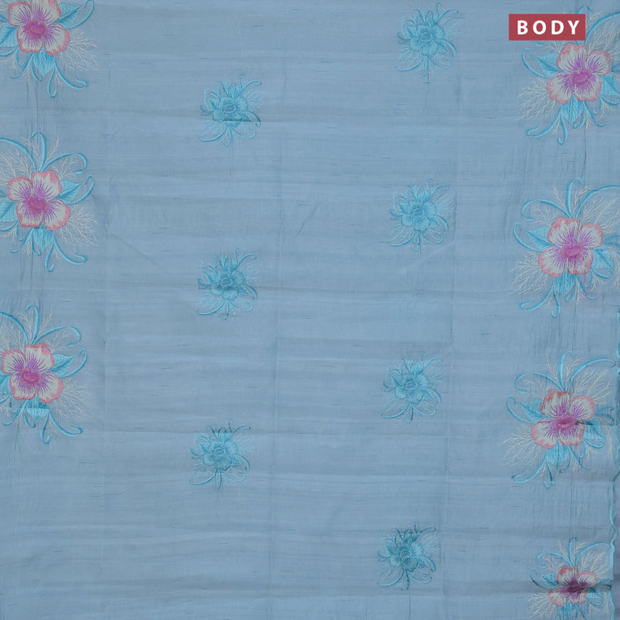 Semi raw silk saree teal blue shade with embroidery work buttas and floral design embroidery work butta border