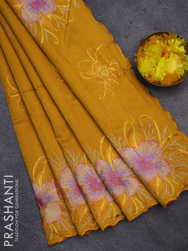 Semi raw silk saree mustard yellow with embroidery work buttas and floral design embroidery work butta border