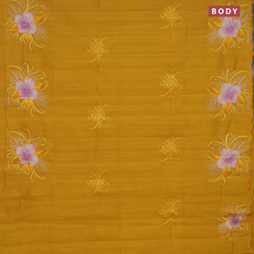 Semi raw silk saree mustard yellow with embroidery work buttas and floral design embroidery work butta border