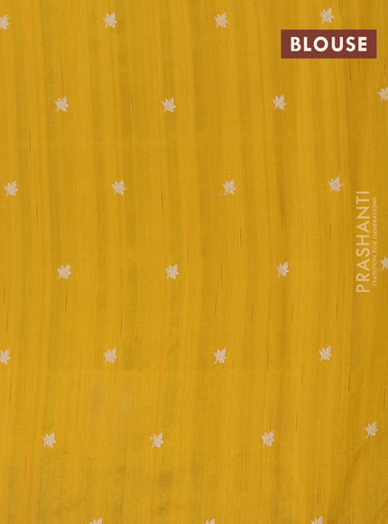 Semi raw silk saree mustard yellow with embroidery work buttas and floral design embroidery work butta border