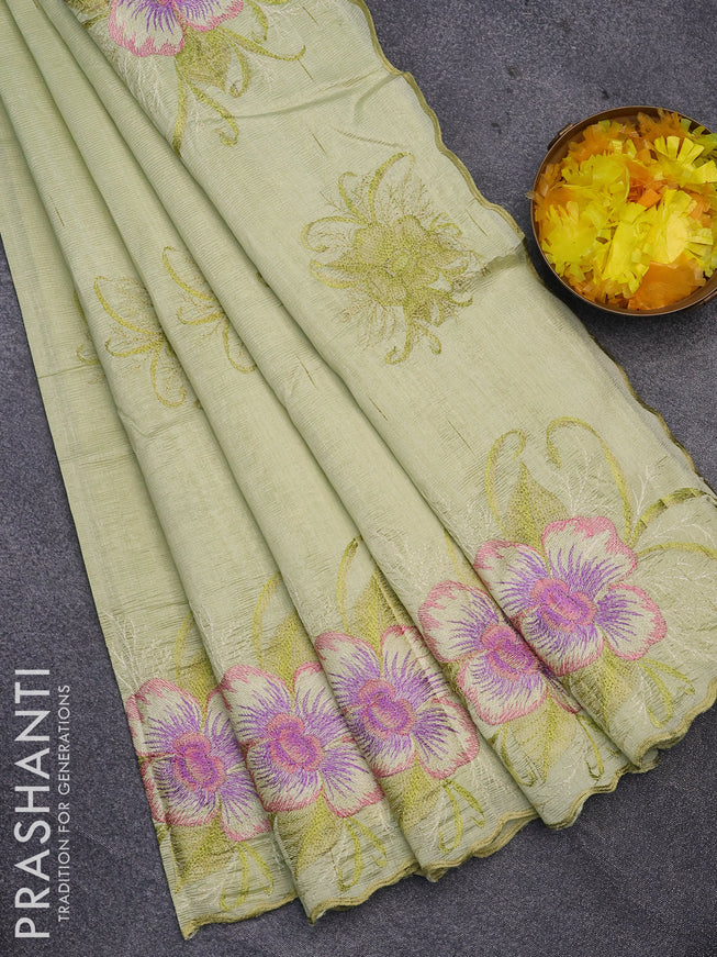 Semi raw silk saree pista green with embroidery work buttas and floral design embroidery work butta border