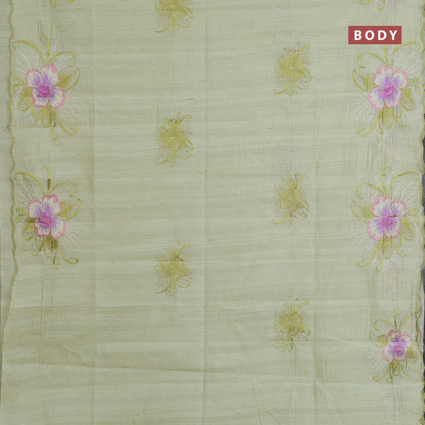 Semi raw silk saree pista green with embroidery work buttas and floral design embroidery work butta border