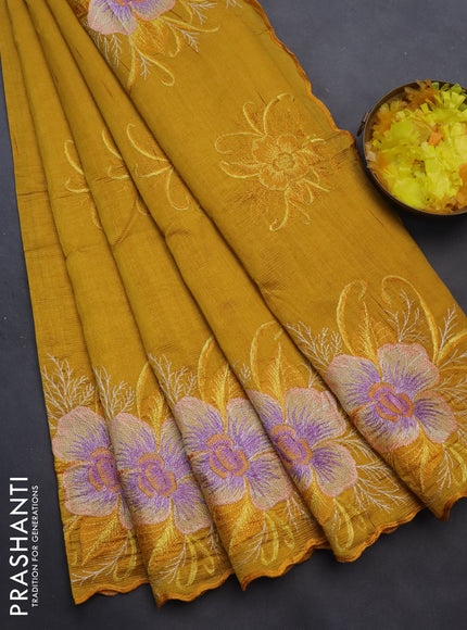 Semi raw silk saree mustard yellow with embroidery work buttas and floral design embroidery work butta border