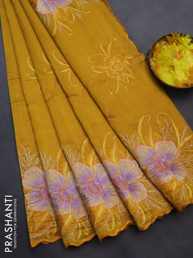 Semi raw silk saree mustard yellow with embroidery work buttas and floral design embroidery work butta border