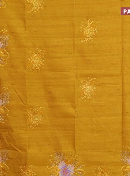 Semi raw silk saree mustard yellow with embroidery work buttas and floral design embroidery work butta border