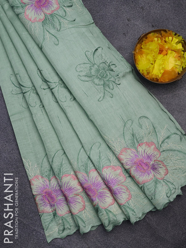 Semi raw silk saree teal green shade with embroidery work buttas and floral design embroidery work butta border