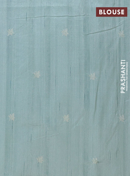 Semi raw silk saree teal green shade with embroidery work buttas and floral design embroidery work butta border