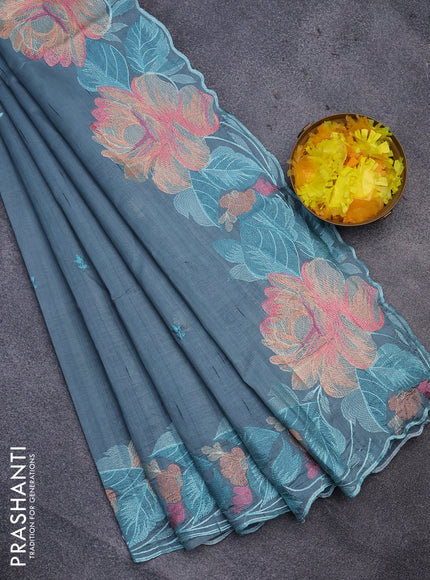 Semi raw silk saree pastel blue with embroidery work buttas and floral design embroidery work butta border