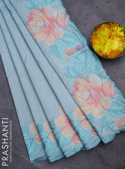 Semi raw silk saree teal blue shade with embroidery work buttas and floral design embroidery work butta border