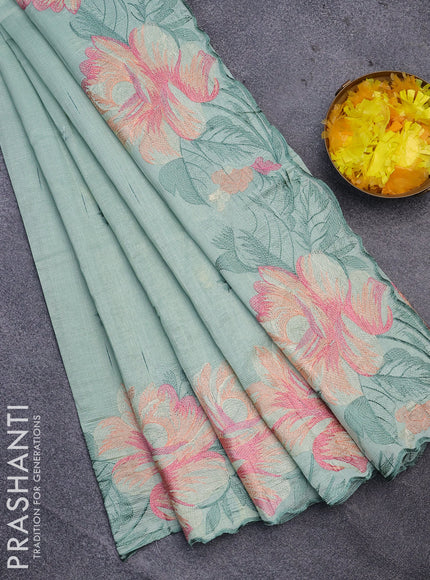 Semi raw silk saree pastel green shade with embroidery work buttas and floral design embroidery work butta border