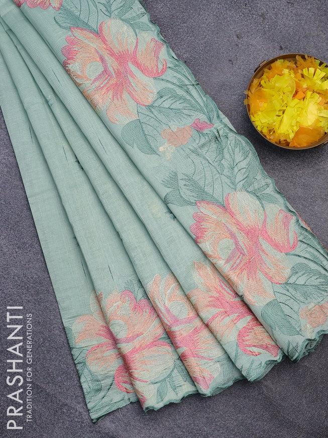 Semi raw silk saree pastel green shade with embroidery work buttas and floral design embroidery work butta border