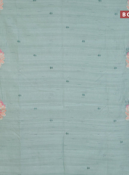 Semi raw silk saree pastel green shade with embroidery work buttas and floral design embroidery work butta border