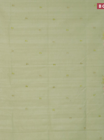 Semi raw silk saree pista green with embroidery work buttas and floral design embroidery work butta border