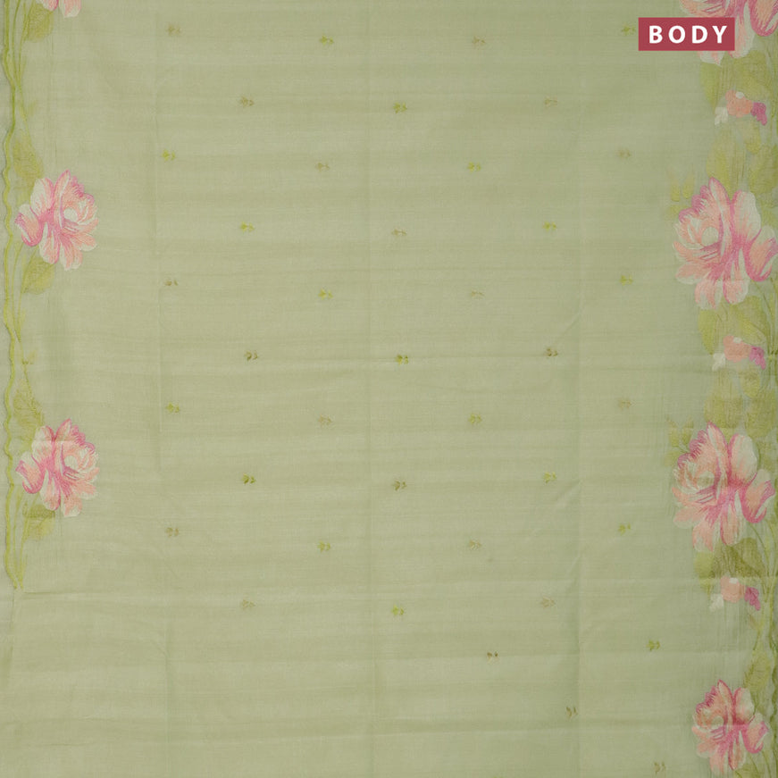 Semi raw silk saree pista green with embroidery work buttas and floral design embroidery work butta border