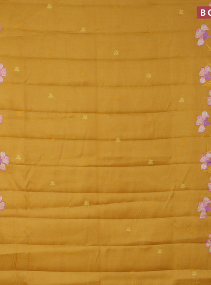 Semi raw silk saree mustard yellow with embroidery work buttas and floral design embroidery work border