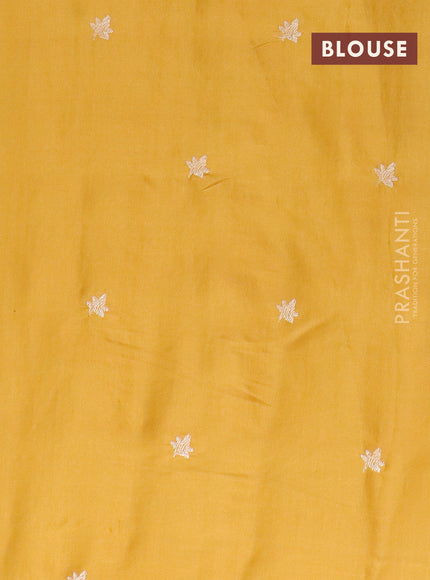 Semi raw silk saree mustard yellow with embroidery work buttas and floral design embroidery work border