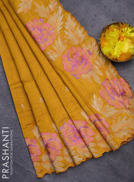 Semi raw silk saree mustard yellow with embroidery work buttas and floral design embroidery work border