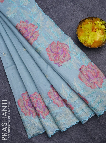 Semi raw silk saree teal blue with embroidery work buttas and floral design embroidery work border