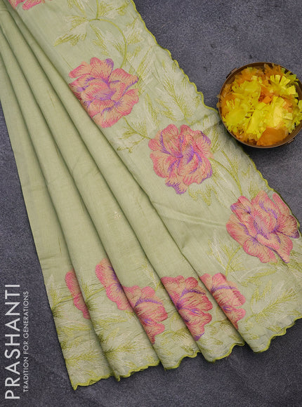 Semi raw silk saree pista green with embroidery work buttas and floral design embroidery work border