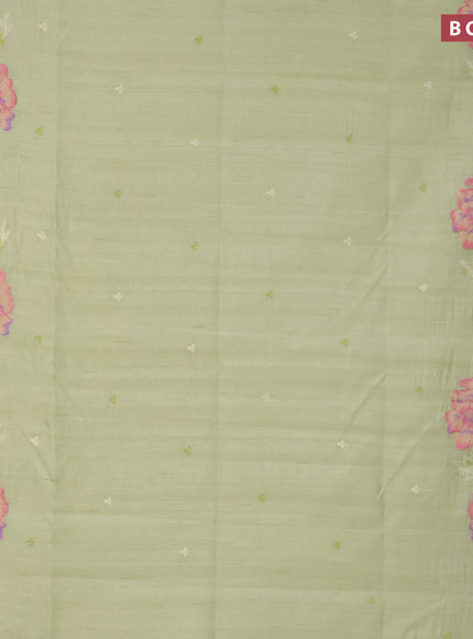 Semi raw silk saree pista green with embroidery work buttas and floral design embroidery work border